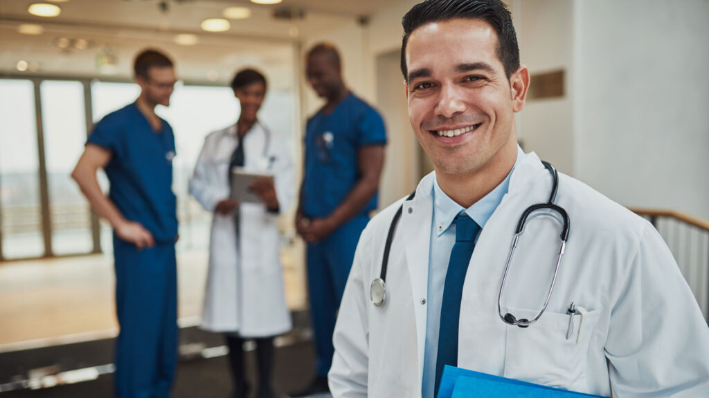 doctor with abeaming smile Using Lenvitz Products